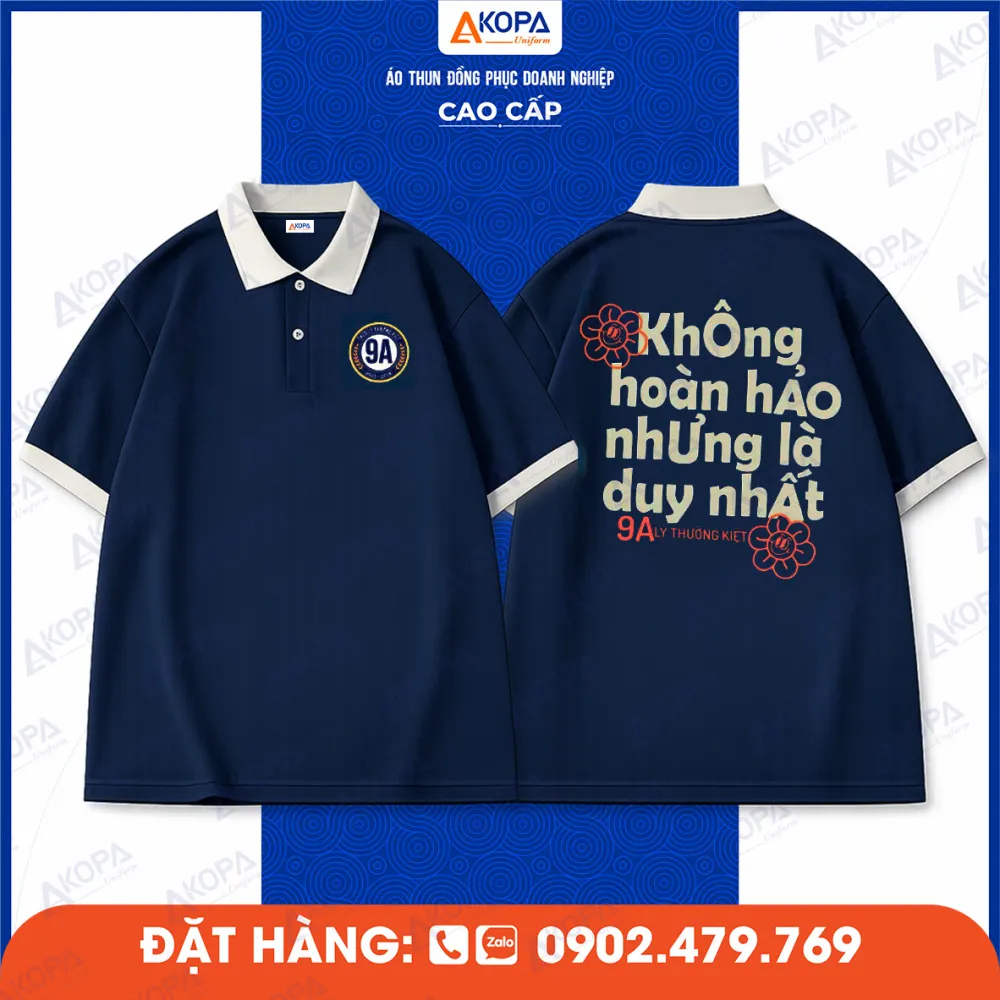 Áo polo xanh navy 9A in slogan “Không hoàn hảo nhưng là duy nhất”