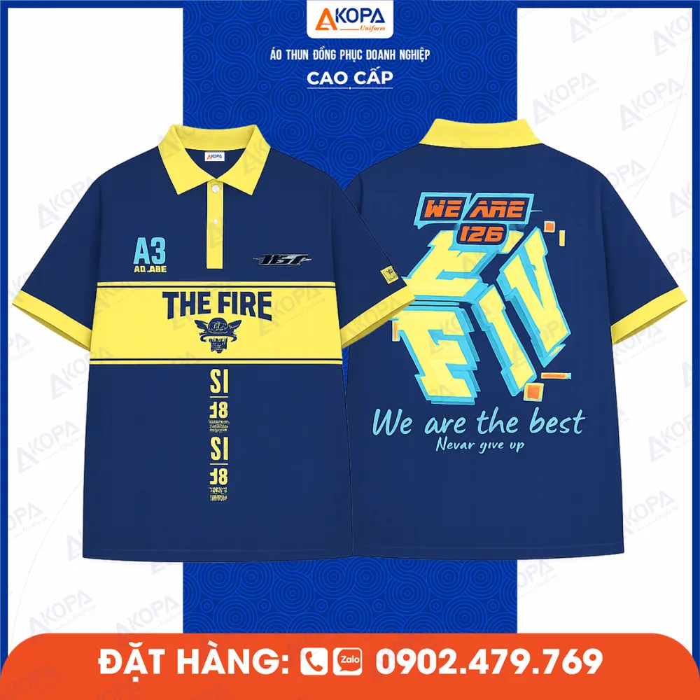 Áo lớp xanh đậm phối vàng in slogan The Fire